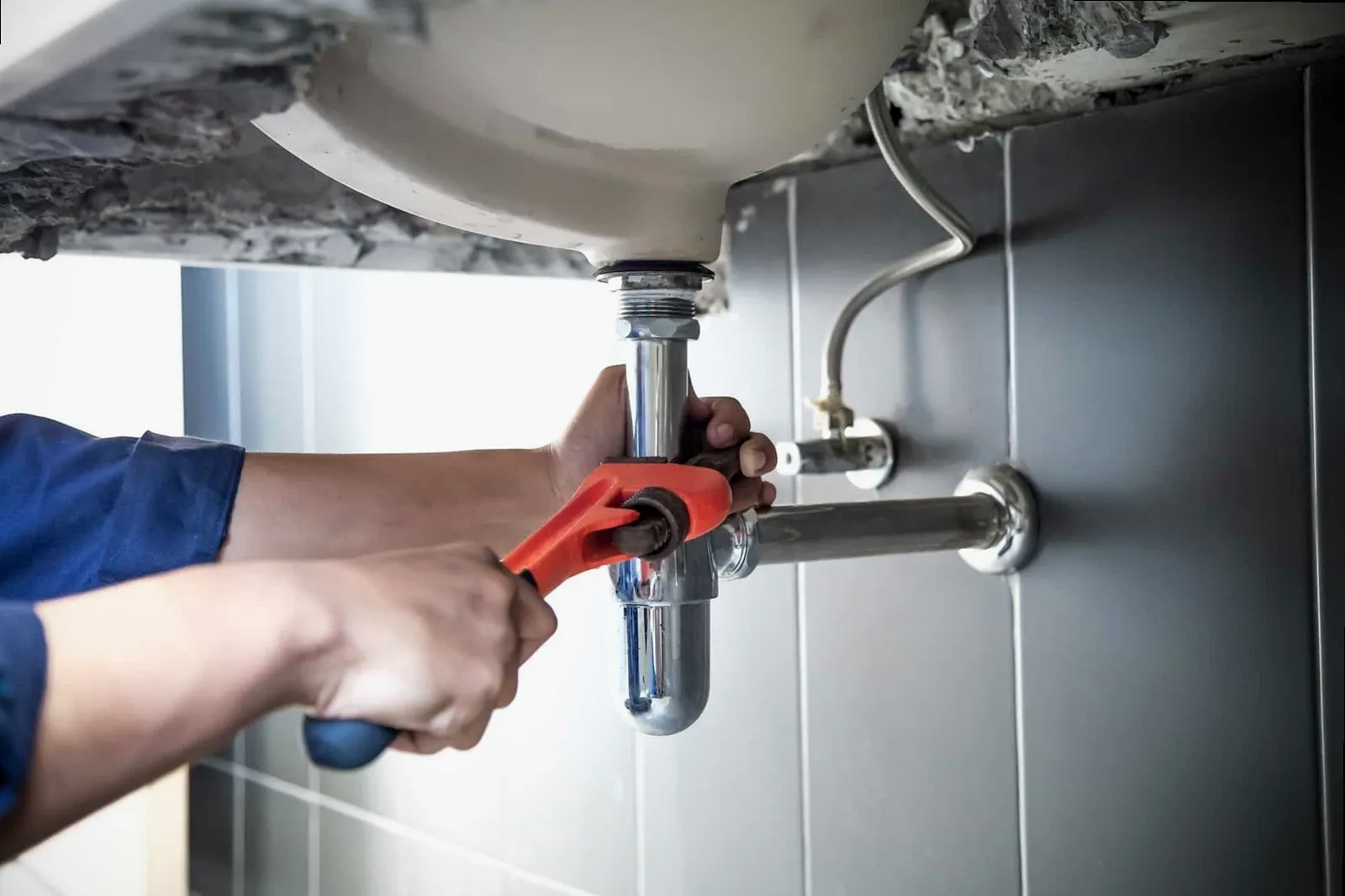 Outdoor Faucet Repair technician at work in Madison, CT